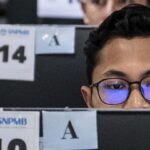 Peserta UTBK SNBT 2025 sedang fokus mengerjakan soal ujian komputer sebagai bagian dari strategi persiapan menghadapi seleksi masuk PTN.
